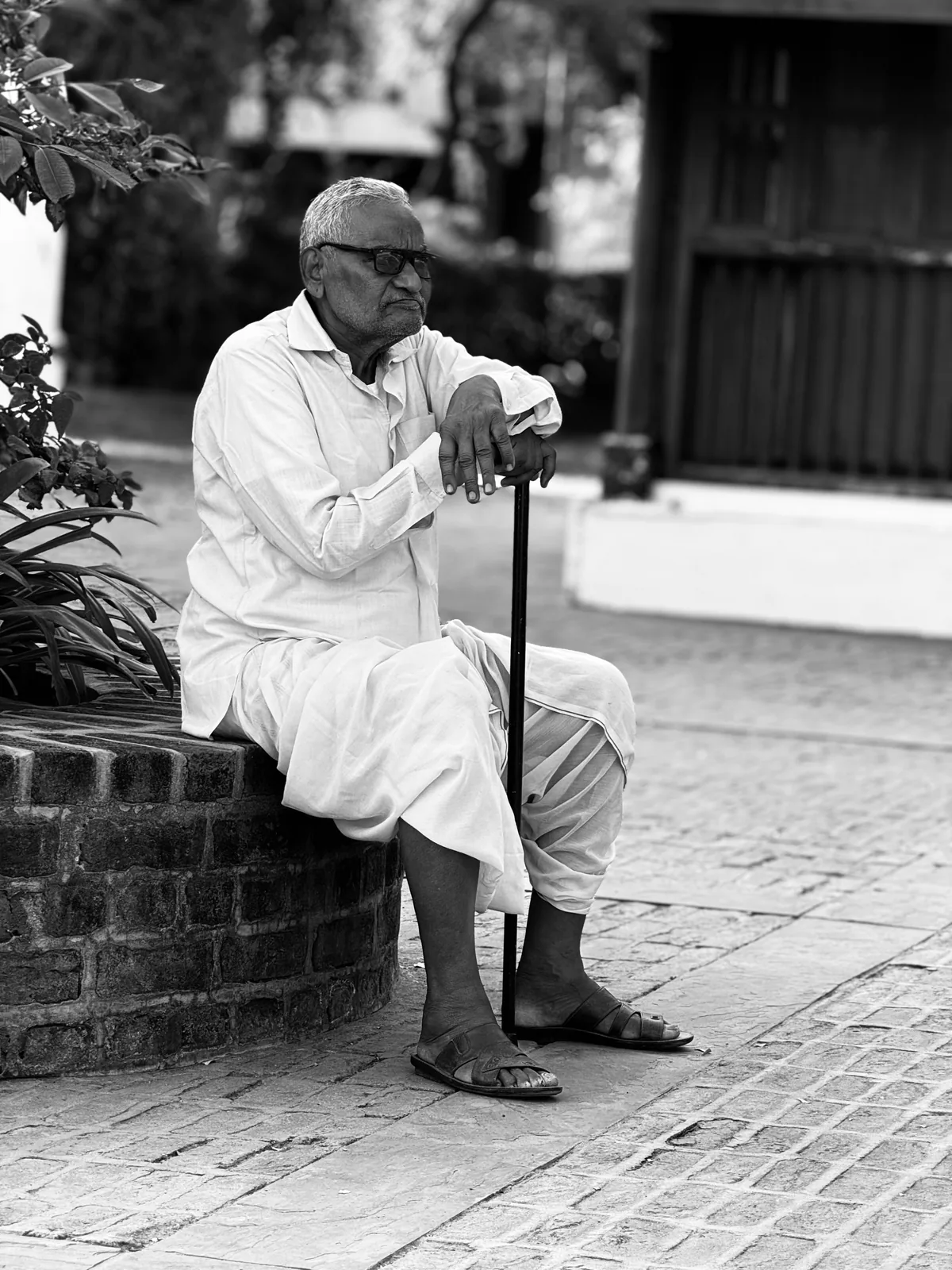 Older man taking a relaxed daytime walk outdoors