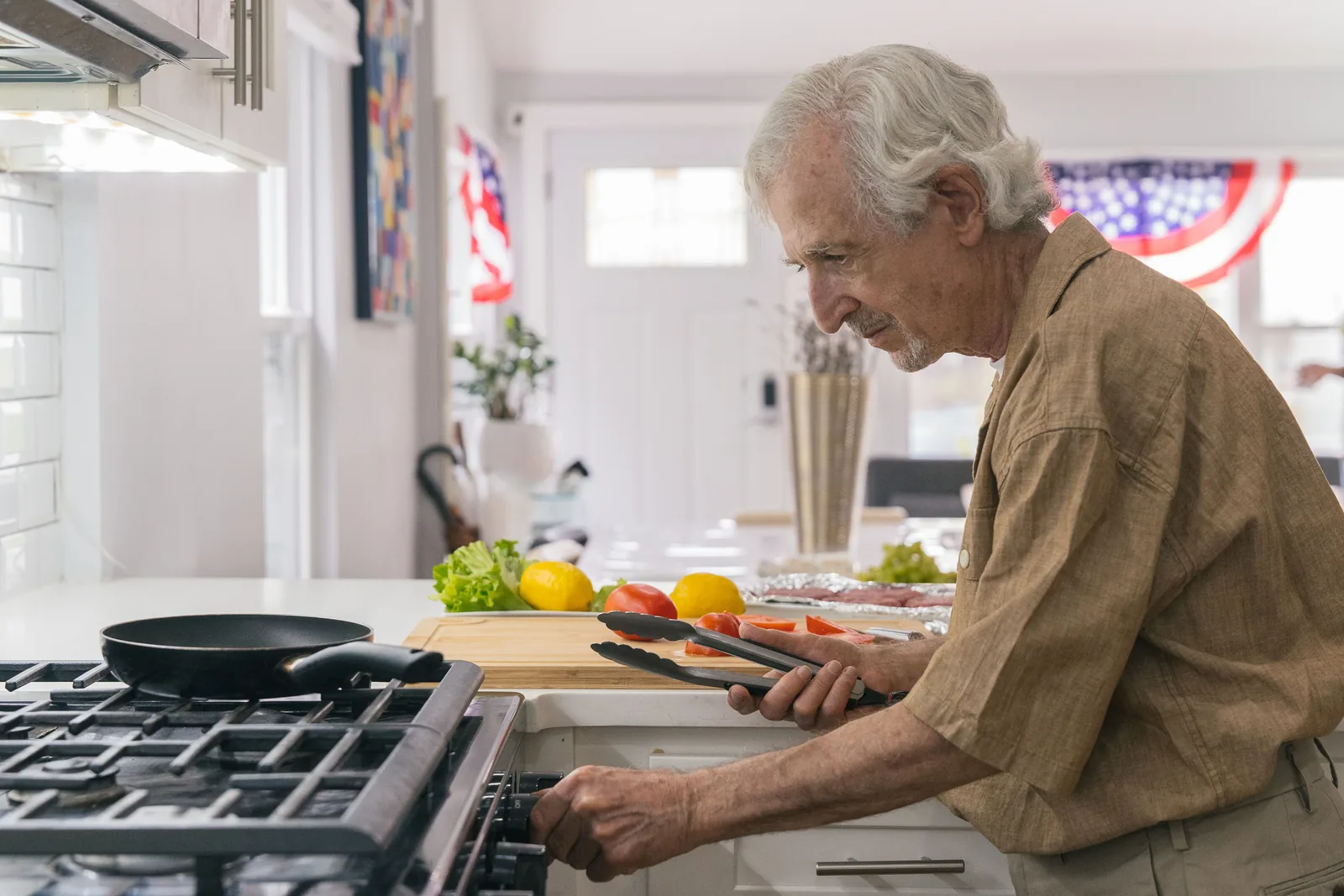 Older man preparing an everyday meal with fresh ingredients